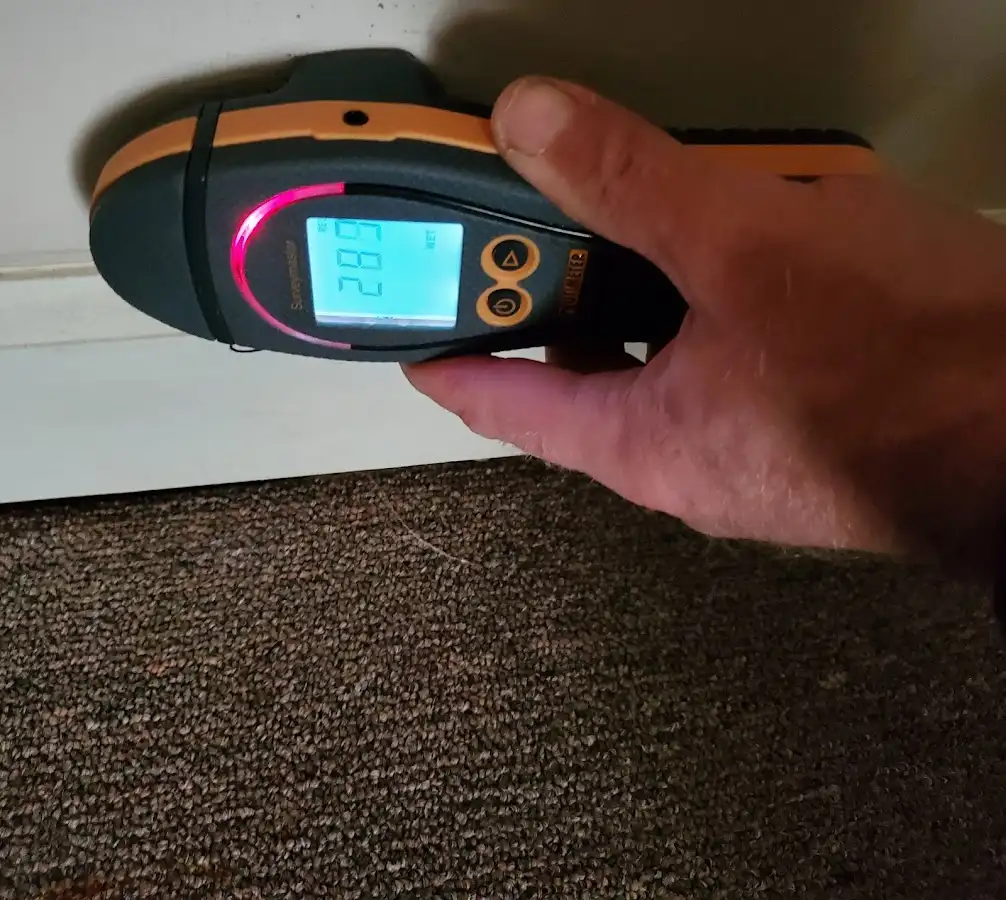 Moisture detection at baseboard during Burst Pipe Cleanup in Lancaster